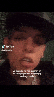 a close up of a person 's face with a caption that says " tiktok "