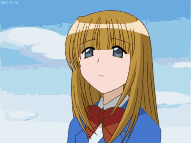 a cartoon girl with long blonde hair and green eyes