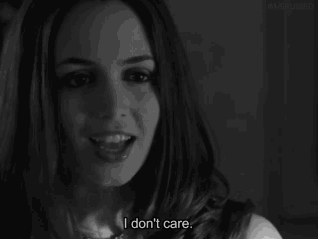 a black and white photo of a woman with the words i don 't care below her