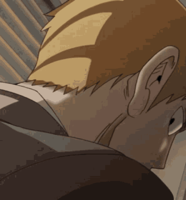 a close up of a man 's head with a shadow on it