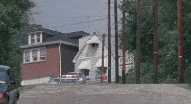 a police car is parked in front of a sign that says police