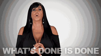 a woman says " what 's done is done " in front of a grey background