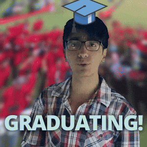 a man in a plaid shirt with a graduation cap on his head says " graduating "