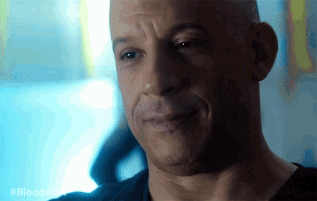 a close up of a man 's face with the hashtag #bloodshot visible
