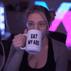 a woman is drinking out of a mug that says eat my ass