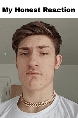 a young man wearing a gold chain around his neck with the words my honest reaction below him