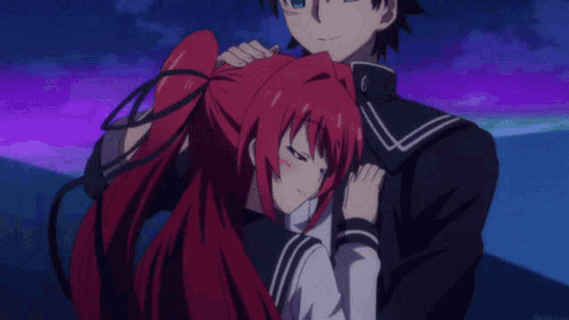 a girl with red hair is being hugged by a man