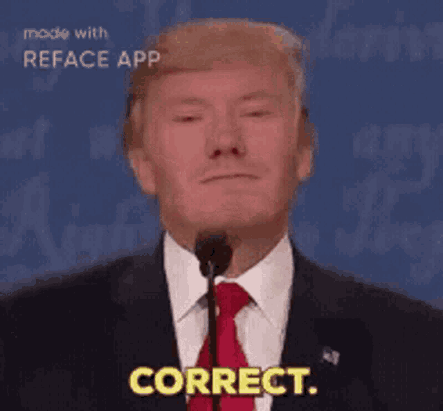 a man in a suit and tie is giving a speech and says correct
