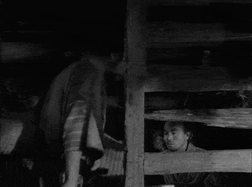 two men in kimonos are standing next to each other in a black and white photo