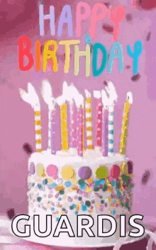 a birthday cake with candles on it and the words `` happy birthday guardis '' on it .