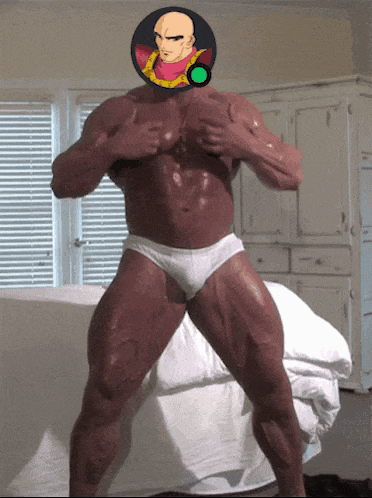 a man with a cartoon character on his head is standing on a bed