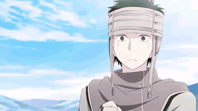 a man with a bandage on his head is looking at something