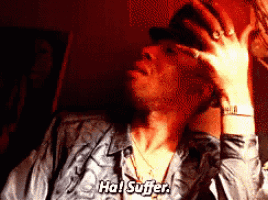 a pixelated image of a man with the words " ha ! suffer " on the bottom