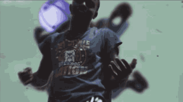 a man wearing a t-shirt that says ' bulldog nation ' on it