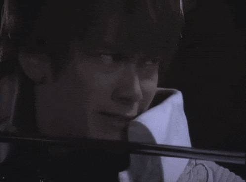 a man playing a violin with the words " looks like it 's time we finished this " below him