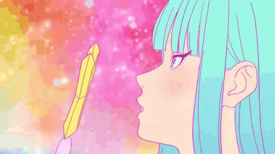 a girl with blue hair stands in front of a rainbow colored sky