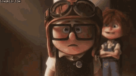 a girl stands in an attic with senogif.com written on the bottom right