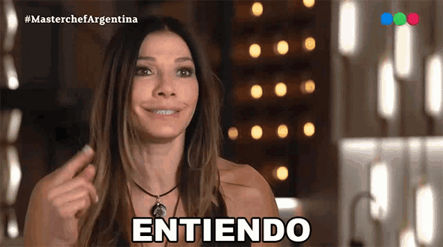 a woman says " entiendo " in a foreign language