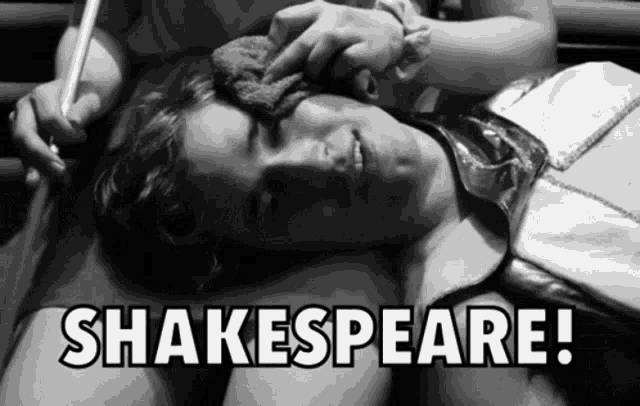 a black and white photo of a man laying on a bed with the words shakespeare above him