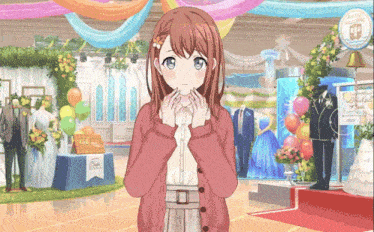 a girl in a red cardigan is standing in front of a sign that says happy wedding