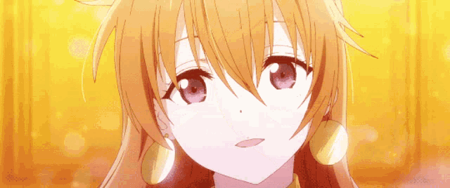 a close up of a girl 's face with orange hair