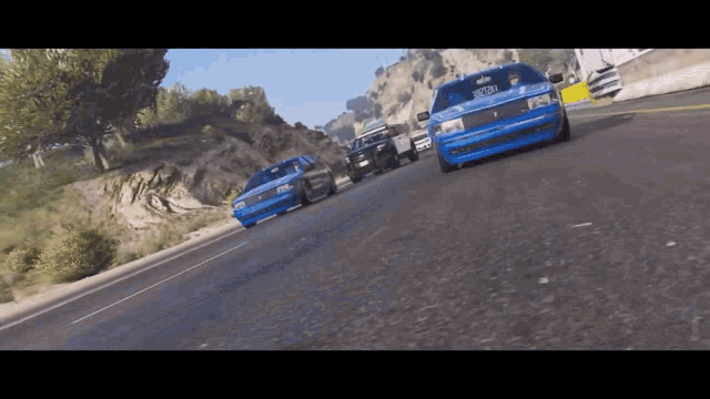 three cars are driving down a road and one has a license plate that says ' sdc '