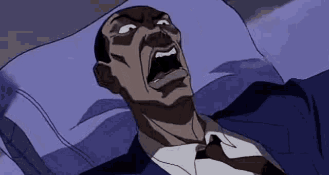 a man in a suit and tie is laying in bed with his mouth open and screaming .