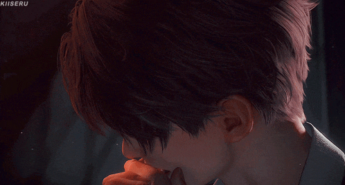 a close up of a person 's face with the name kiiiseru visible