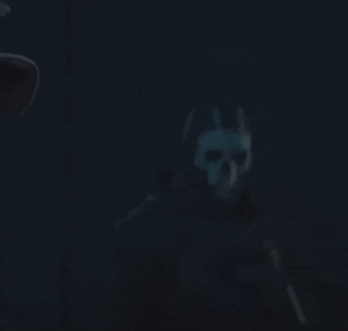 a person with a skull mask on their face