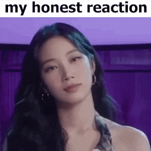 a close up of a woman 's face with the words `` my honest reaction '' above her .