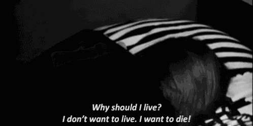 a black and white photo of a person with the words why should i live i don 't want to live