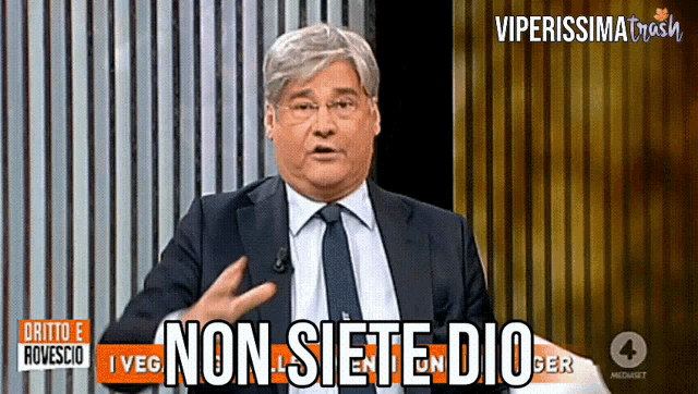 a man in a suit and tie says non siete dio on a tv screen