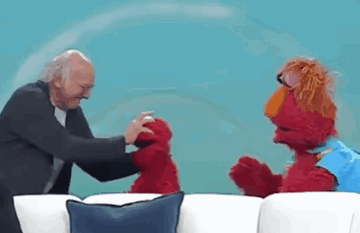 Elmo Attack Larry David GIF - Elmo Attack Larry David Larry David Elmo GIFs