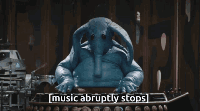 a blue elephant with the words music abruptly stops