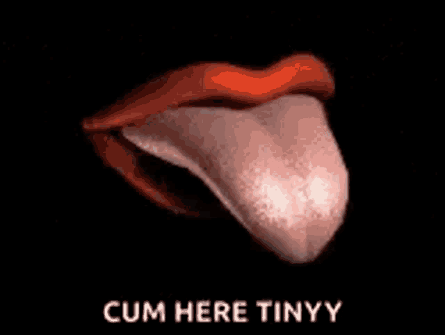 a close up of a woman 's tongue sticking out with the words cum here tinyy .