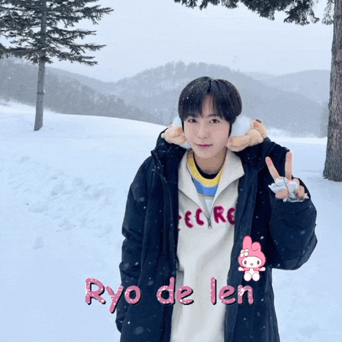 a person standing in the snow with ryo de len written in pink