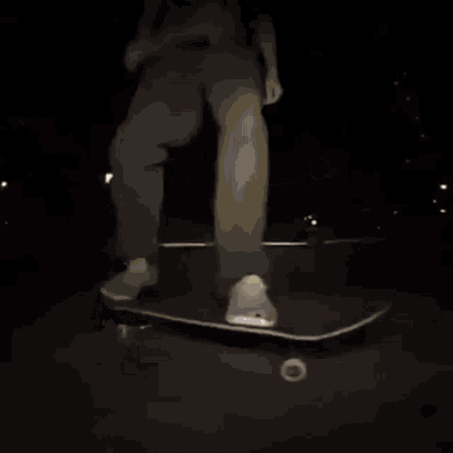 a person 's feet are shown in a dark room