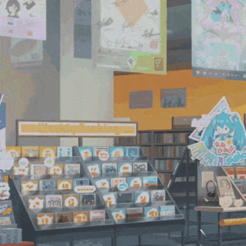 a weekly reading sign hangs from the ceiling above a display of books