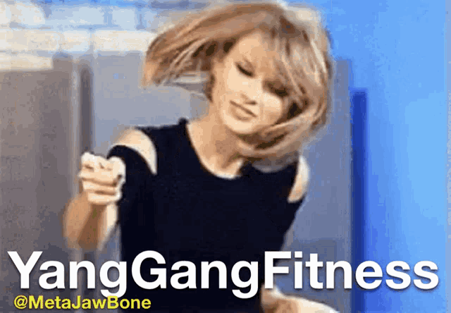 a picture of a woman dancing with the words yang gang fitness in the background