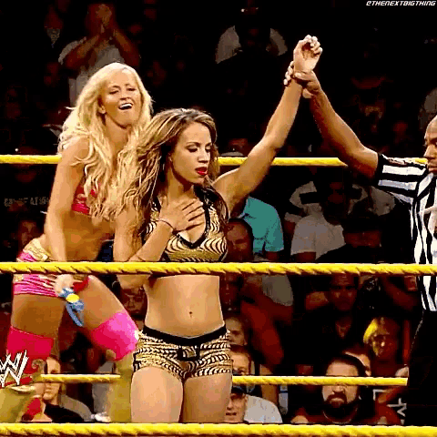 a woman in a wrestling ring with the word ethenextbig thing on the bottom