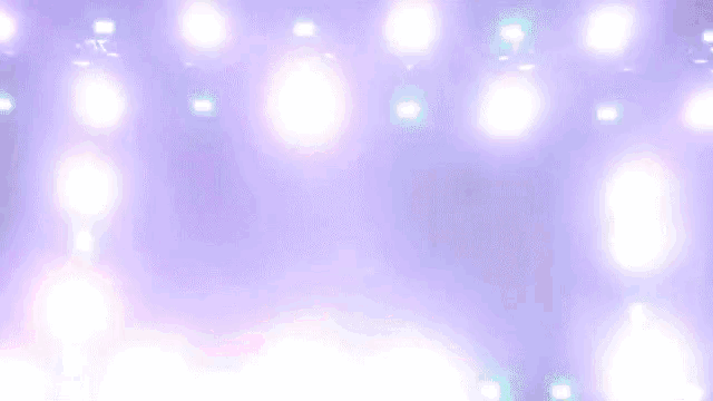 the word love is displayed on a screen with a lot of lights