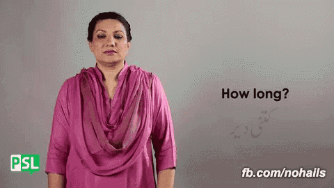 a woman wearing a pink shirt is asking how long