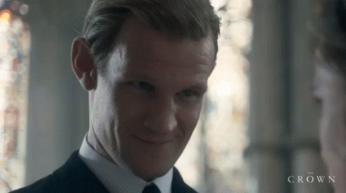 Philip Shrug Face At The Alter GIF - The Crown Netflix Phillip GIFs