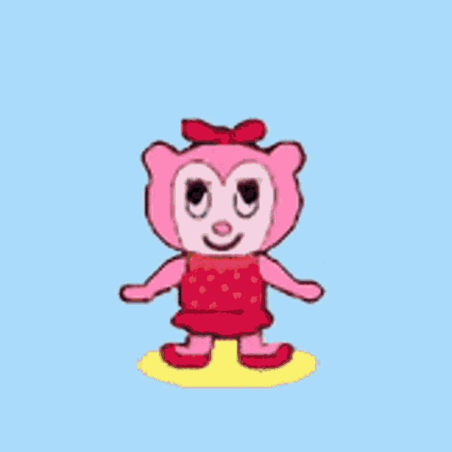 a pink teddy bear wearing a red dress and red shoes