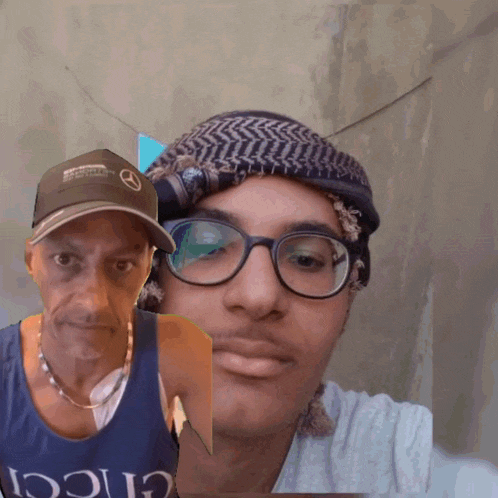 a man wearing glasses and a hat that says mercedes on it