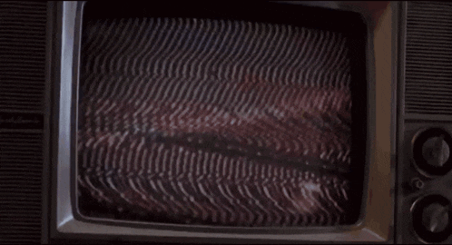 a tv with a purple and white striped pattern on it