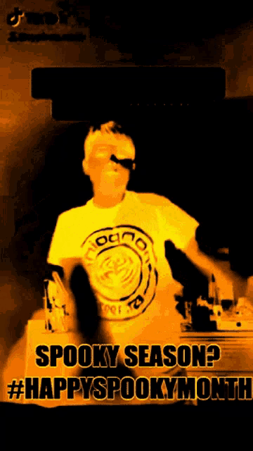 a poster that says spooky season and happy spooky month