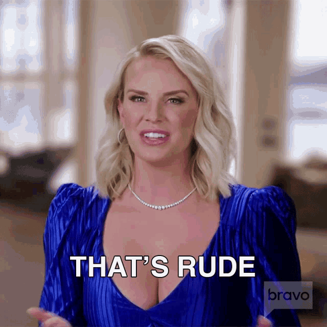 a woman in a blue dress says that 's rude on bravo