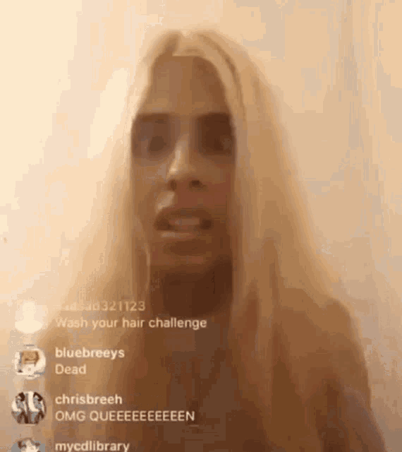 a woman with long blonde hair is talking to someone on a live stream .