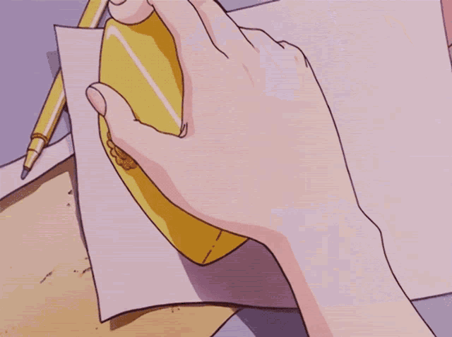 a person is writing on a piece of paper that says iu